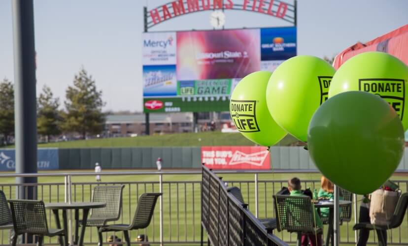 Baseball field with balloons