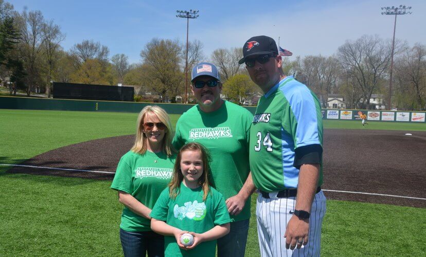 From left, Rhonda, Claire and Aaron Robert with Southeast Missouri State baseball coach Andy Sawyers