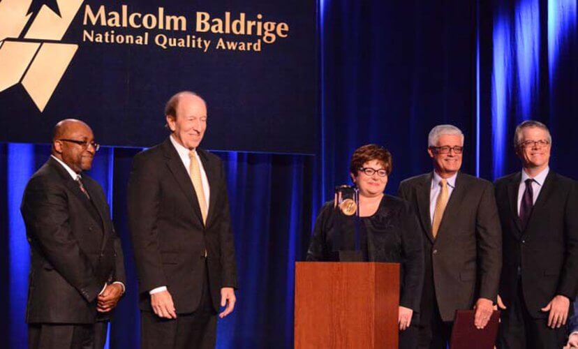 Photo of Mid-America Transplant Leadership accept Baldrige Award