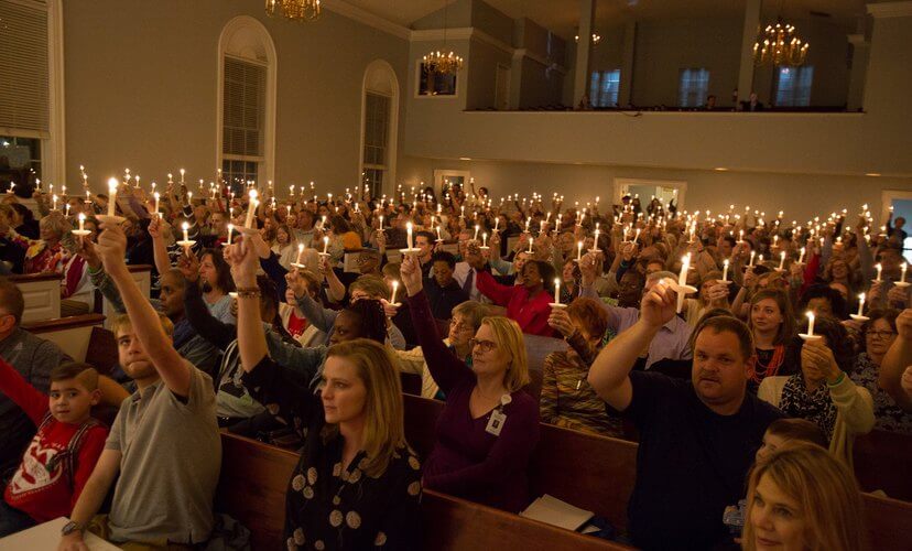 Candles raised in honor of organ and tissue donors at the 2019 St Louis Candlelight Memorial.