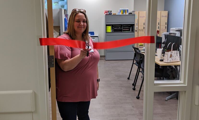 Tissue Team Lead Sara Ham official opens the new work space for the teams who recovery lifesaving tissue gifts..
