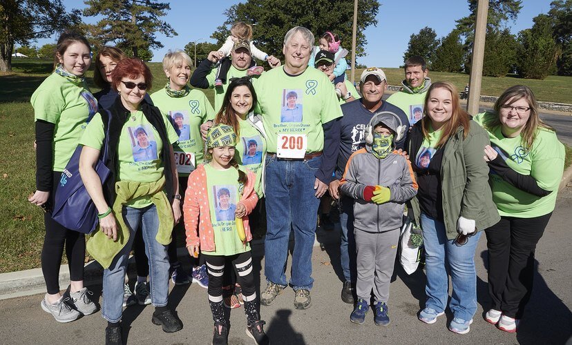 Heart recipient John Sueme with his donor's family.