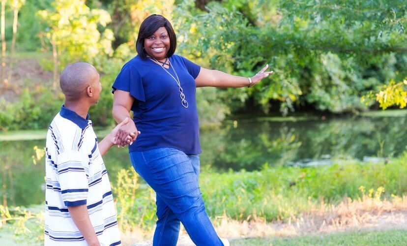 Kidney and pancreas recipient, Nikki Love-McIntyre, walks in Forest Park with her husband.