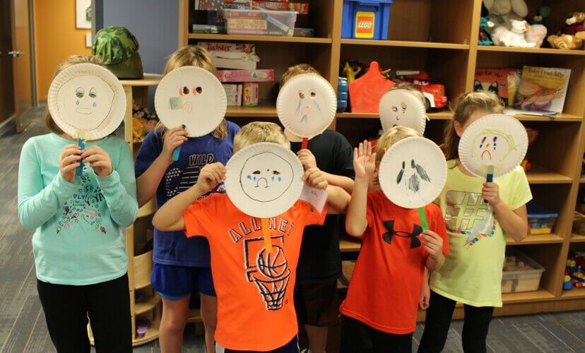 Children participate in a grief support activity at Lost and Found Grief Center.