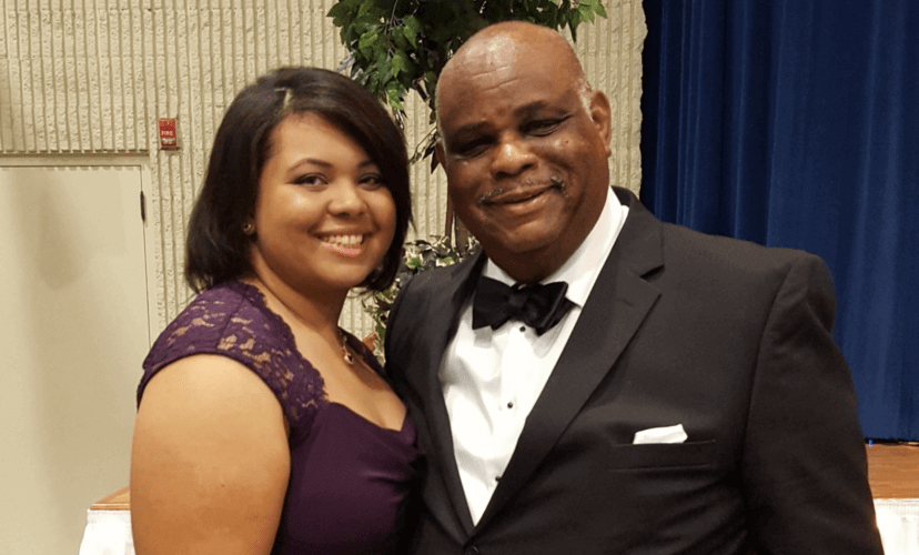 A young woman and her father (Stephen) pose together in formalwear