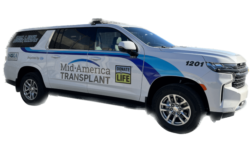 An SUV decorated with the Mid-America Transplant and Donate Life logos.