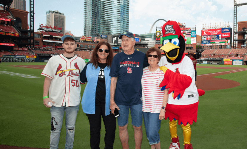 The Lathrop family poses with Fredbird at Busch Stadium. 
