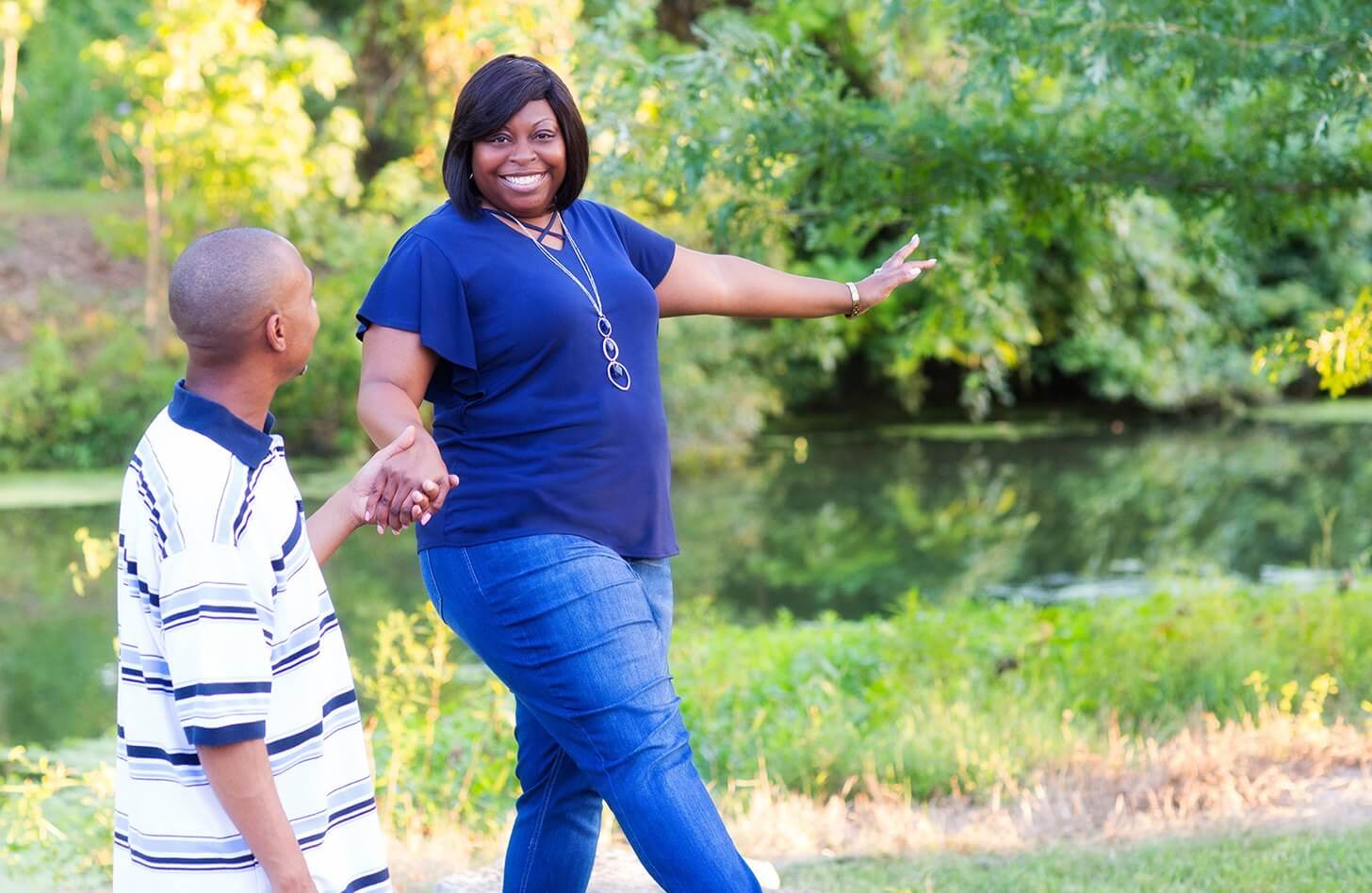 Kidney and pancreas recipient, Nikki Love-McIntyre, walks in Forest Park with her husband.