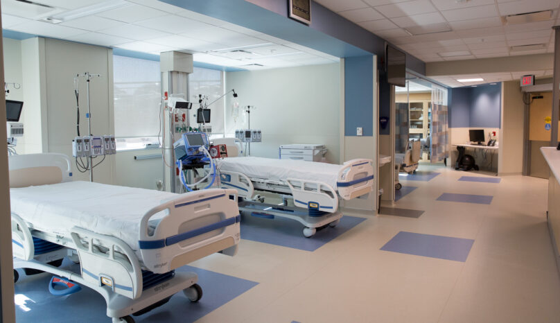 Hospital style beds in the style of an ICU