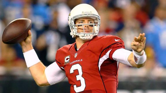 Carson Palmer throwing a football
